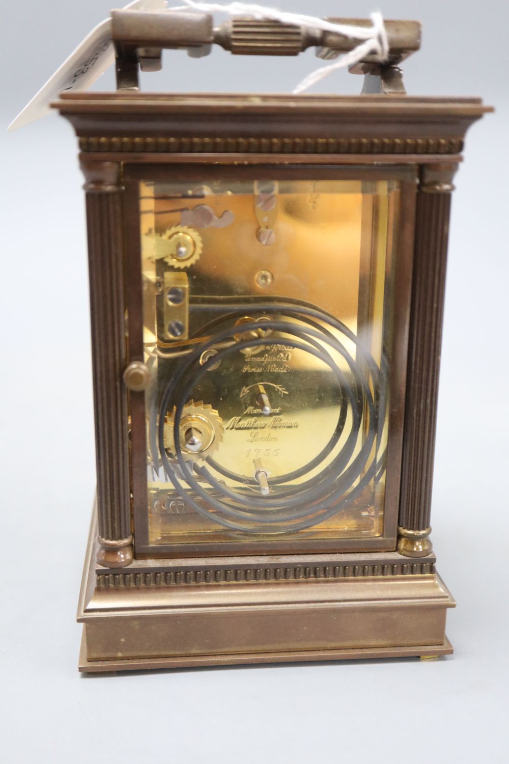 A Matthew Norman brass cased carriage clock, no.1755, overall height 16.5cm (handle down)